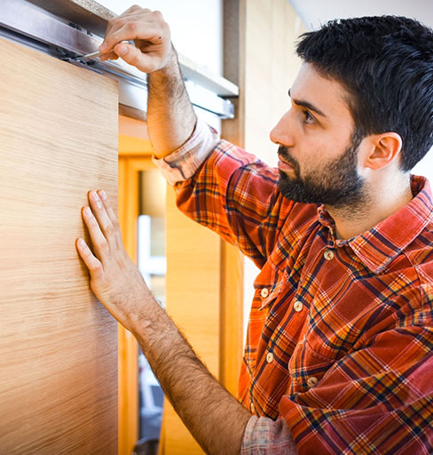 Technician providing garage door service