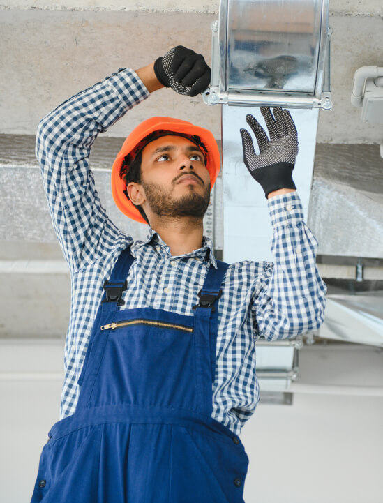 Technician servicing a garage door