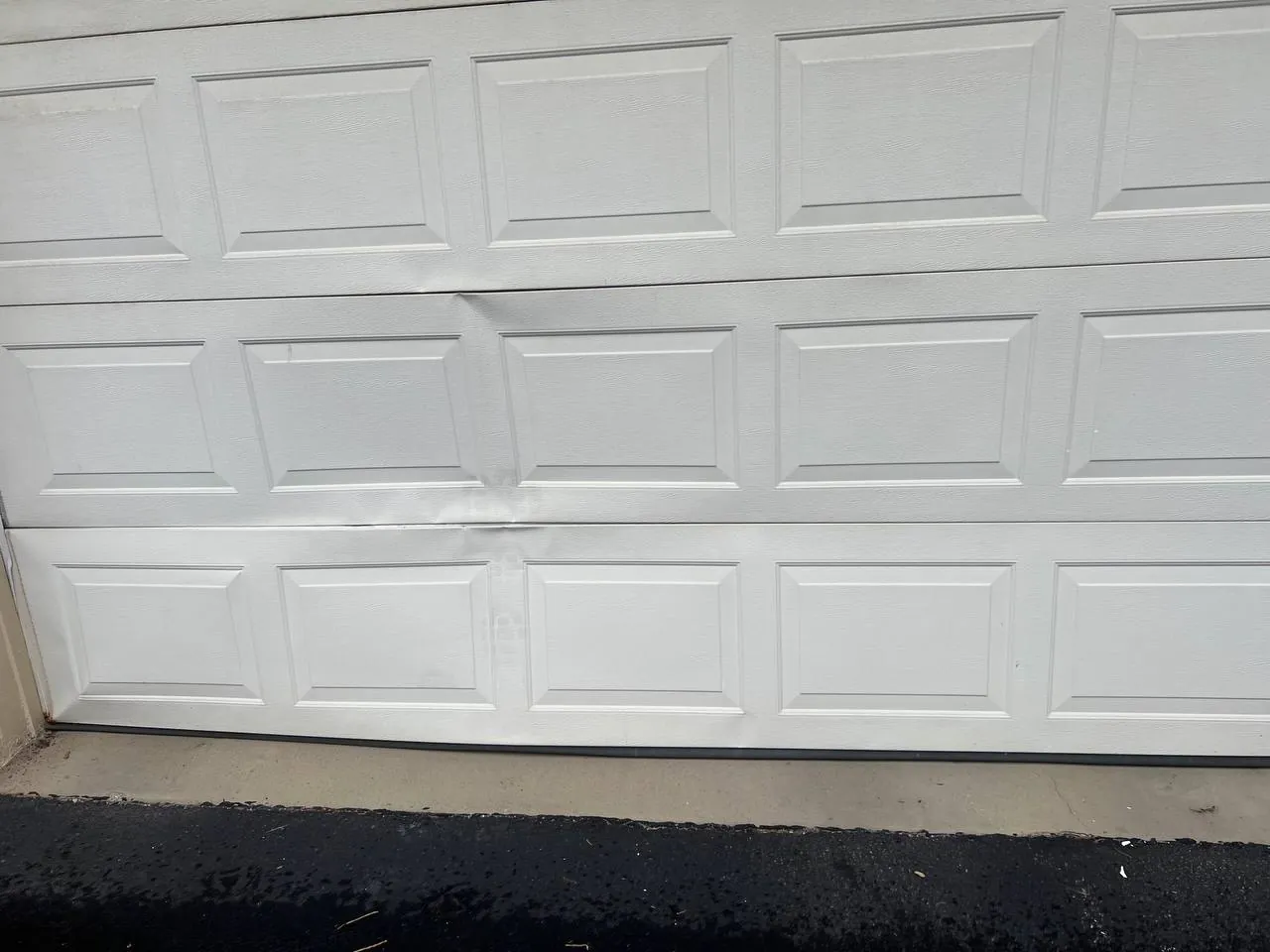 Garage door panel repair