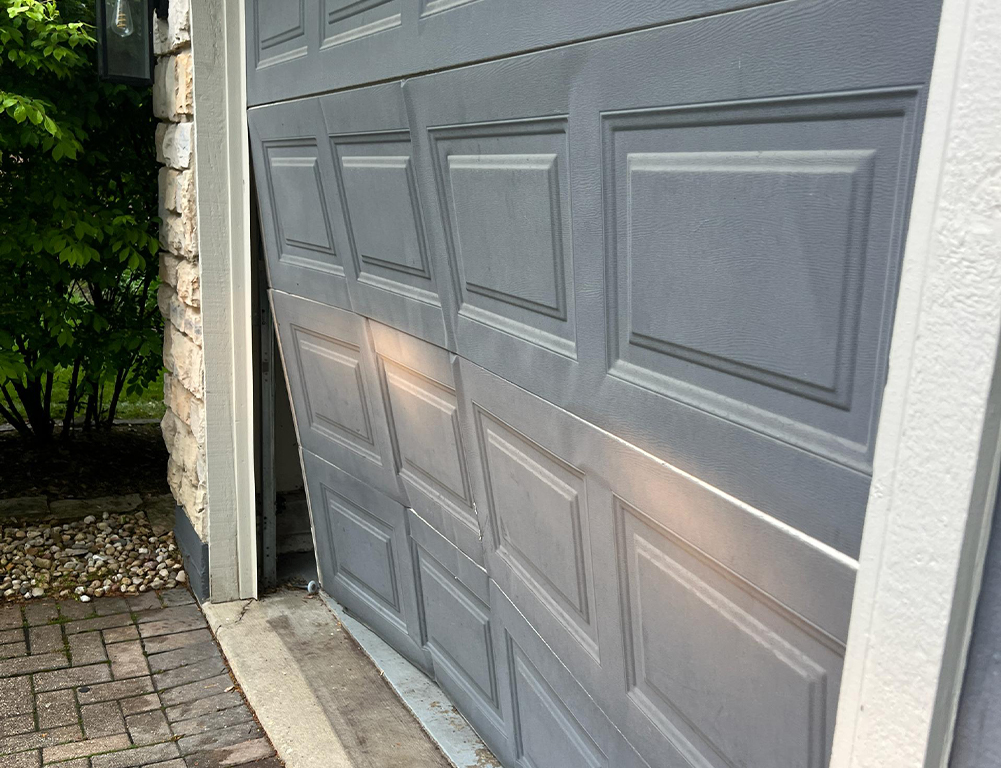 Garage door off-track repair